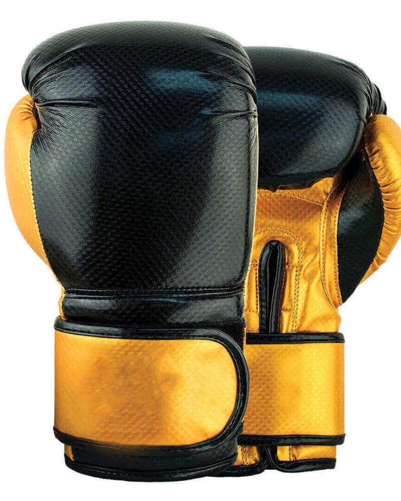 Stylish black and gold boxing gloves with a secure wrist strap for enhanced training and sparring performance.